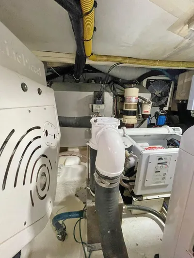  Yacht Photos Pics Engine room of a 2013 Azimut Atlantis 54 yacht showing mechanical components.