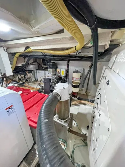  Yacht Photos Pics Engine room of a 2013 Azimut Atlantis 54 yacht with visible machinery and wiring.