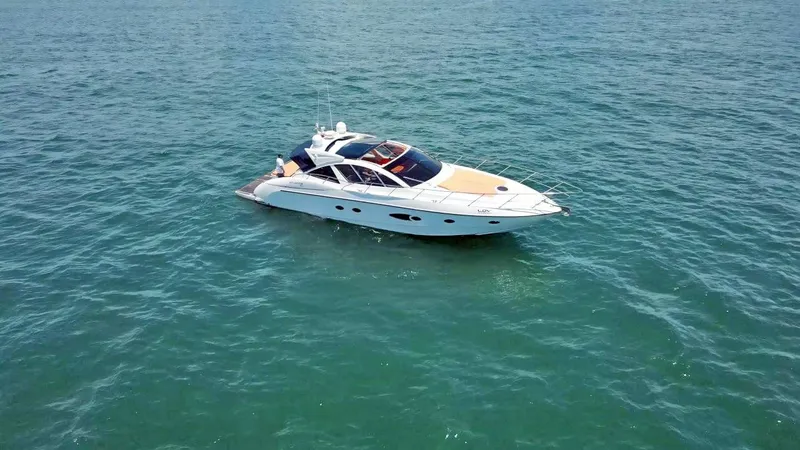  Yacht Photos Pics 2013 Azimut Atlantis 54 yacht cruising on open water.