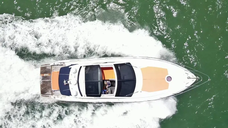  Yacht Photos Pics Aerial view of 2013 Azimut Atlantis 54 yacht cruising on water.