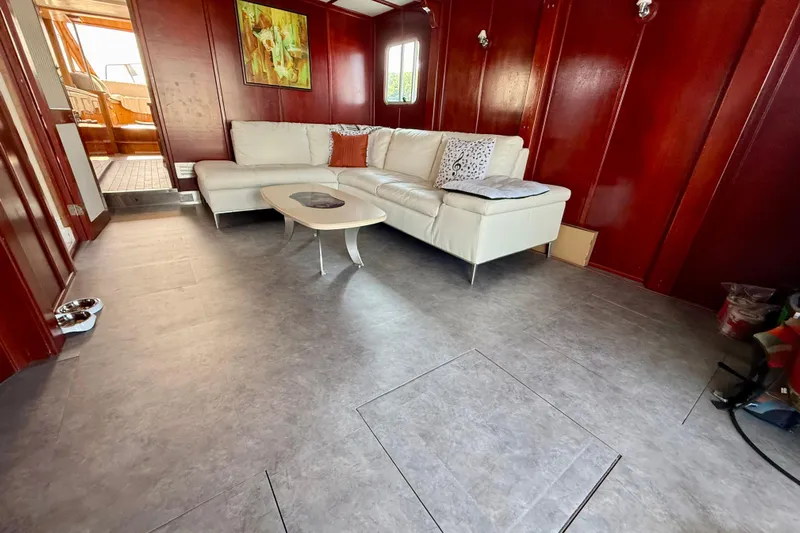  Yacht Photos Pics Luxurious 1994 Custom 60 Trawler interior with white sofa and modern decor.