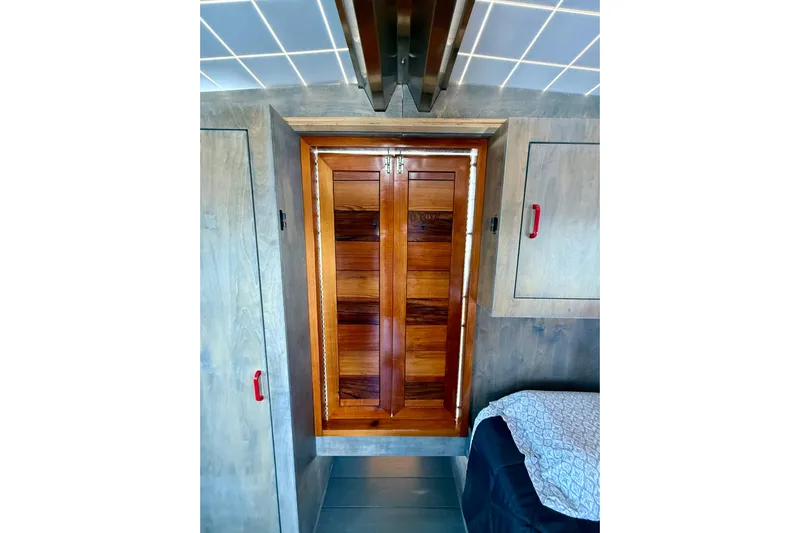  Yacht Photos Pics Interior of 1994 Custom 60 Trawler with wooden cabinet and modern design elements.