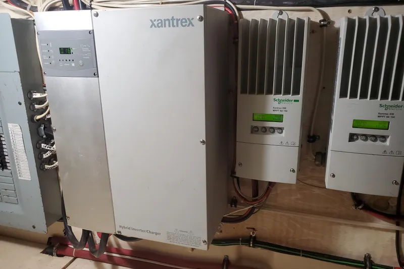  Yacht Photos Pics Electrical system with Xantrex inverter and Schneider controllers on a 1994 Custom 60 Trawler.