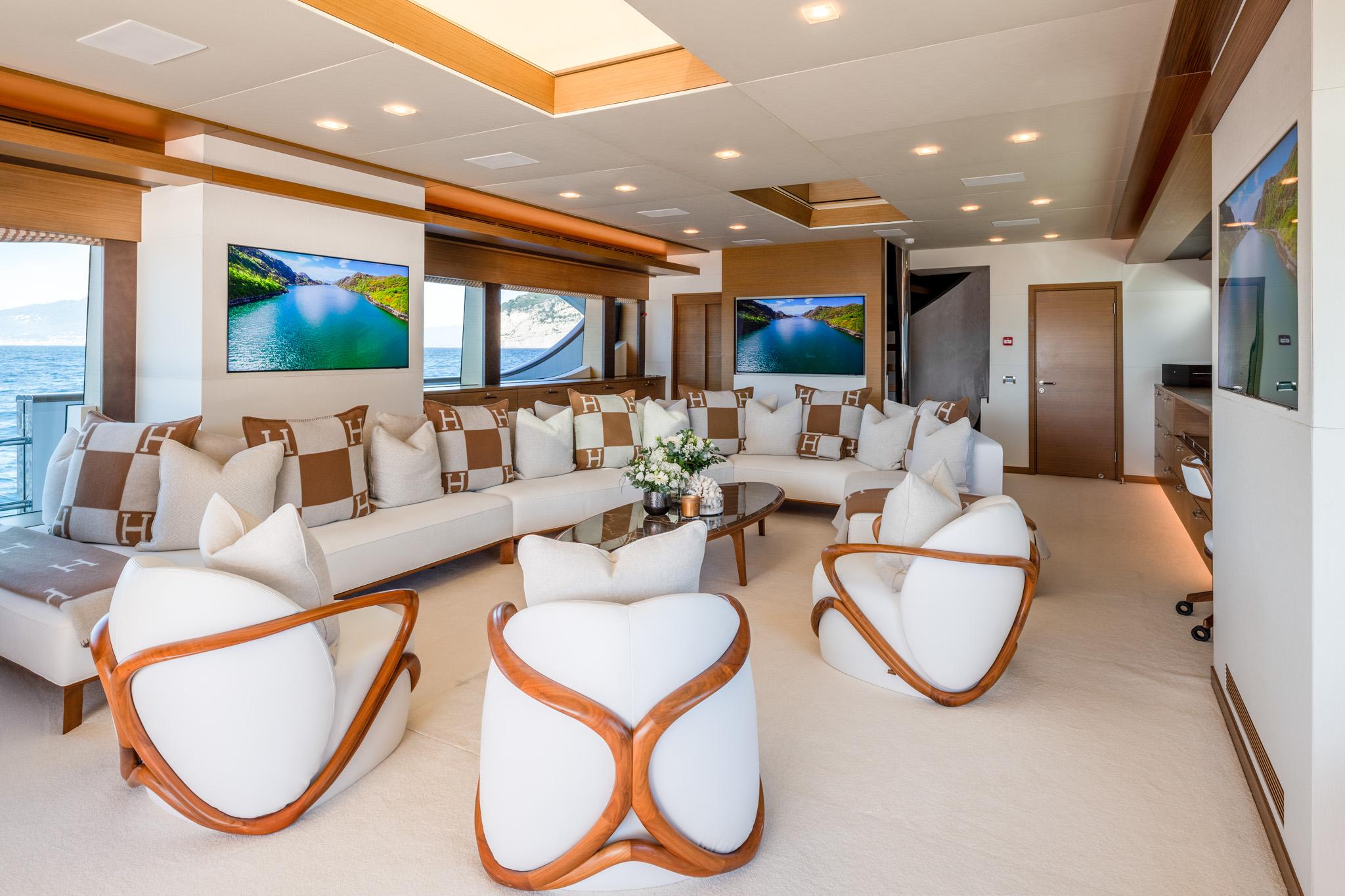 Luxurious yacht interior with modern seating, elegant decor, and scenic views, custom model 2008.