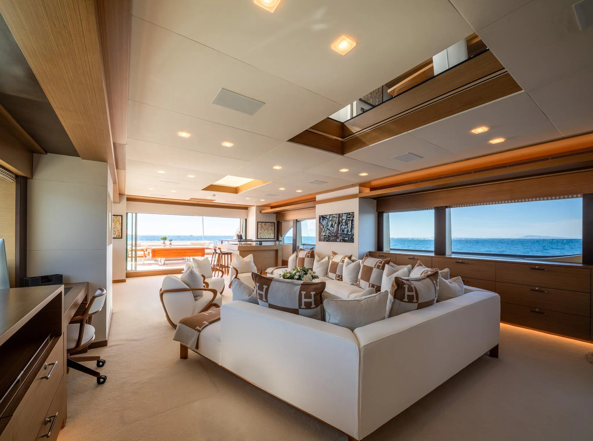 Luxurious yacht interior with ocean view, featuring elegant seating and modern design, custom 2008 model.