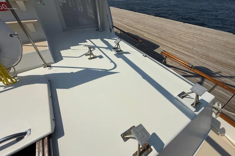  Yacht Photos Pics Deck of 1990 Grand Banks 42 Classic yacht docked by the water.