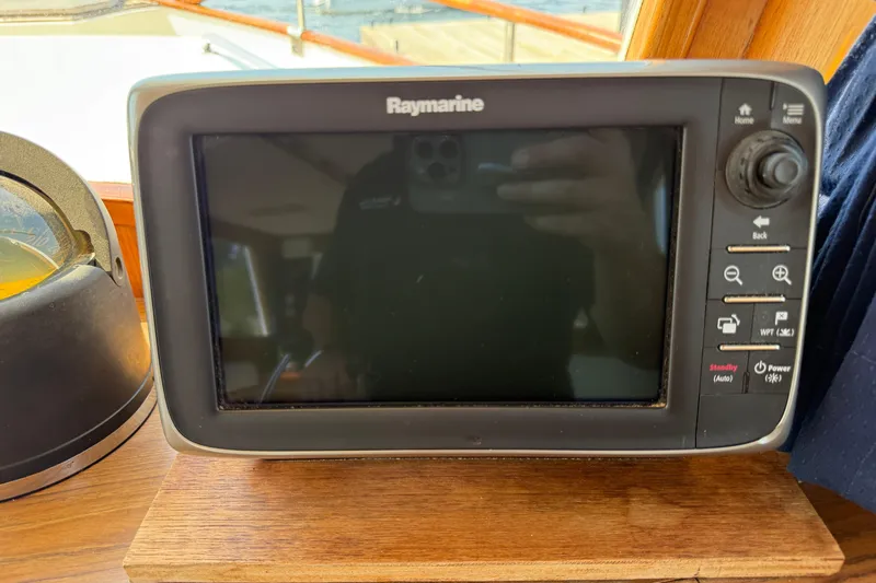  Yacht Photos Pics Raymarine navigation system on 1990 Grand Banks 42 Classic yacht dashboard.