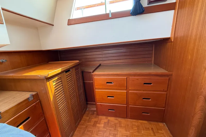  Yacht Photos Pics Wooden interior of 1990 Grand Banks 42 Classic yacht with drawers and cabinets.