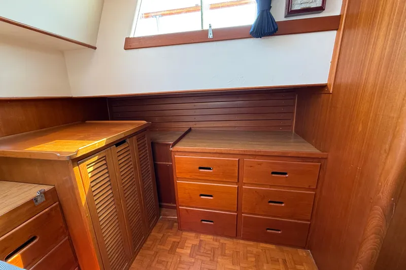  Yacht Photos Pics Interior of 1990 Grand Banks 42 Classic with wooden cabinetry and drawers.