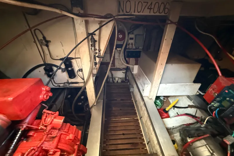  Yacht Photos Pics Engine room of 1990 Grand Banks 42 Classic with visible machinery and wiring.
