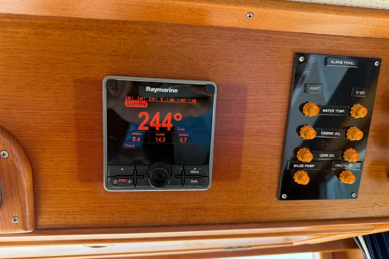  Yacht Photos Pics Raymarine navigation display and alarm panel on 1990 Grand Banks 42 Classic yacht.