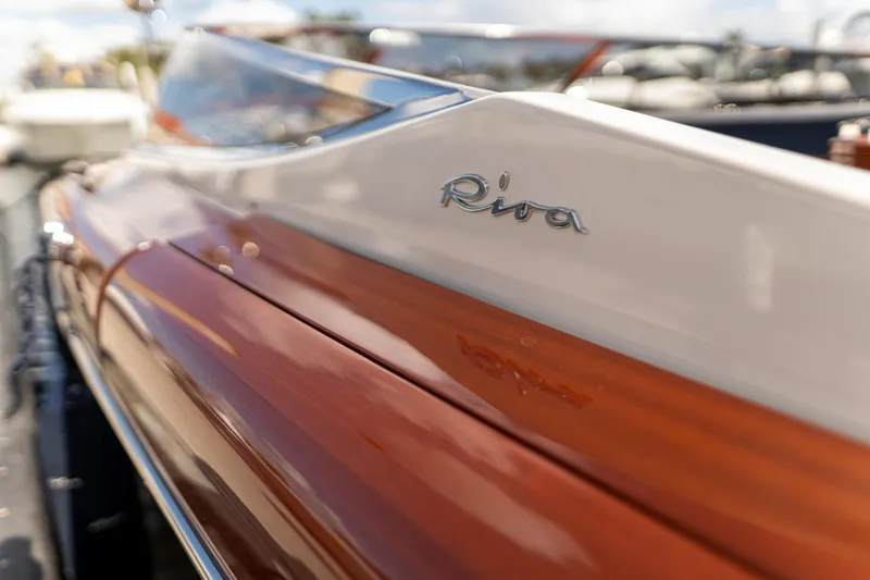 Amore Yacht Photos Pics 2015 Riva Aquariva Super boat with sleek wooden finish and elegant design.