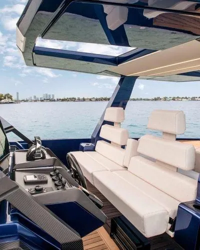  Yacht Photos Pics Luxurious 2021 Wally Tender 48X yacht interior with sleek design and comfortable seating.