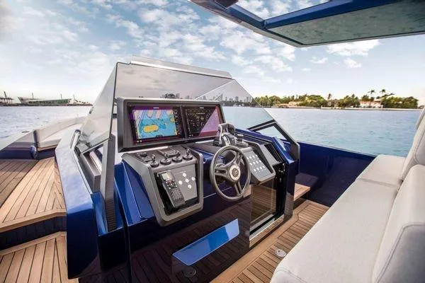  Yacht Photos Pics Cockpit of 2021 Wally Tender 48X yacht with modern navigation system and luxurious seating.