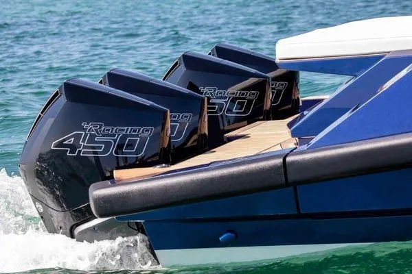  Yacht Photos Pics 2021 Wally Tender 48X with triple Racing 450 engines on turquoise water.