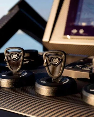  Yacht Photos Pics Control panel of a 2021 Wally Tender 48X yacht with carbon fiber finish.