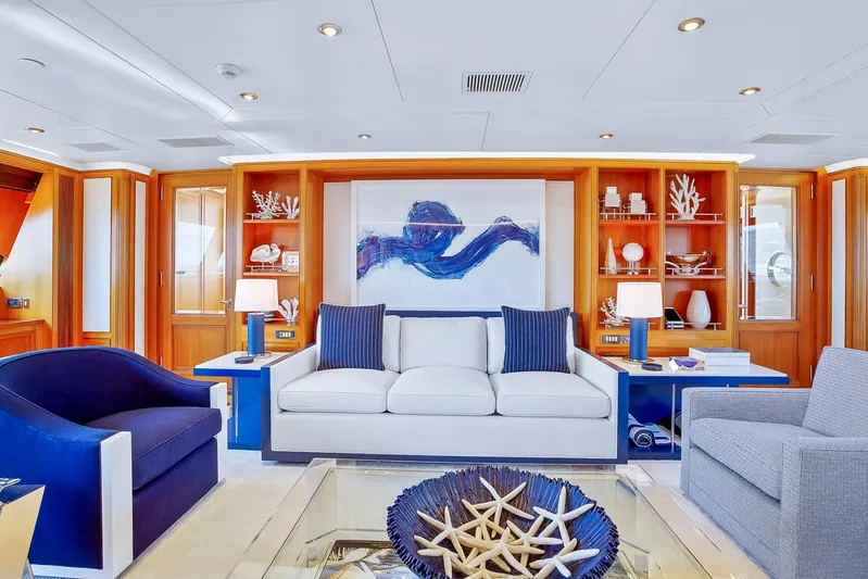 Zenji Yacht Photos Pics Luxurious yacht interior with elegant seating, nautical decor, and modern art; Perini Navi 56m, 2004.