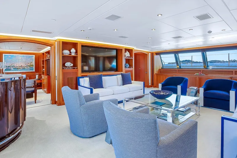 Zenji Yacht Photos Pics Luxurious interior of 2004 Perini Navi 56m yacht with elegant seating and ocean view.