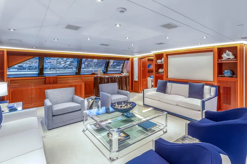 Zenji Yacht Photos Pics Luxurious interior of 2004 Perini Navi 56m yacht with elegant seating and panoramic windows.