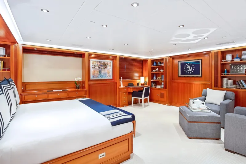 Zenji Yacht Photos Pics Luxurious cabin interior of 2004 Perini Navi 56m yacht with elegant wood paneling.