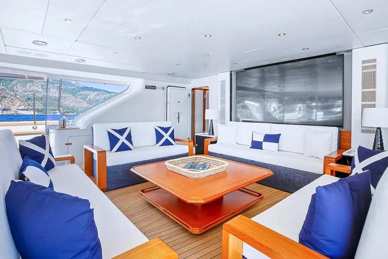 Zenji Yacht Photos Pics Luxurious interior of 2004 Perini Navi 56m yacht with elegant seating and ocean view.