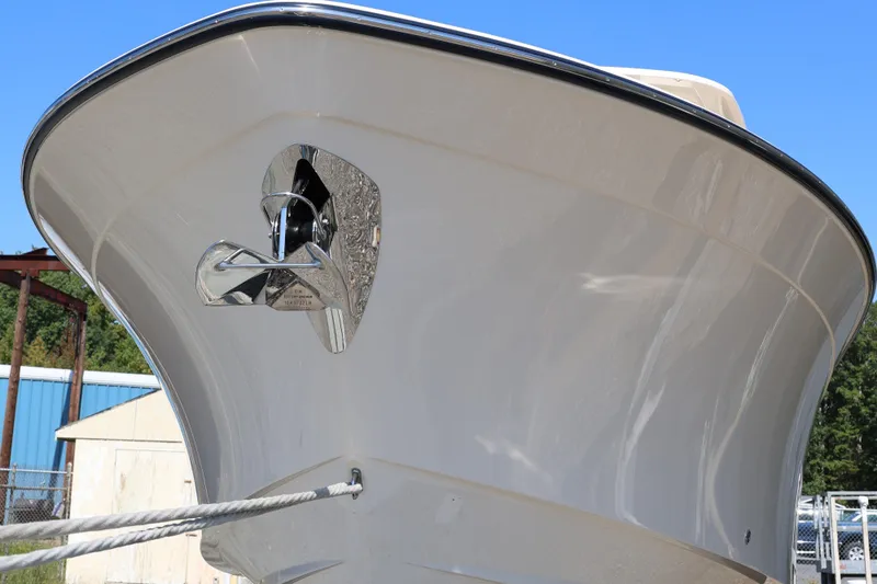  Yacht Photos Pics 2026 Grady-White Canyon 306 boat bow with anchor, clear sky background.