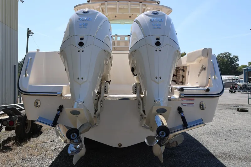  Yacht Photos Pics 2026 Grady-White Canyon 306 boat with dual Yamaha 350 V6 engines, rear view.