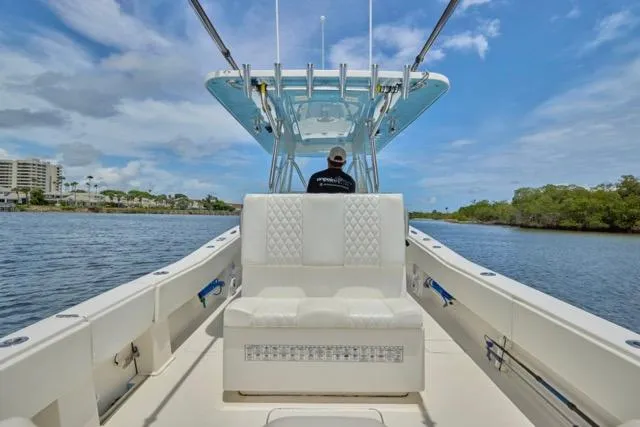  Yacht Photos Pics Invincible 36 boat interior, 2015 model, cruising on a sunny day with clear skies.