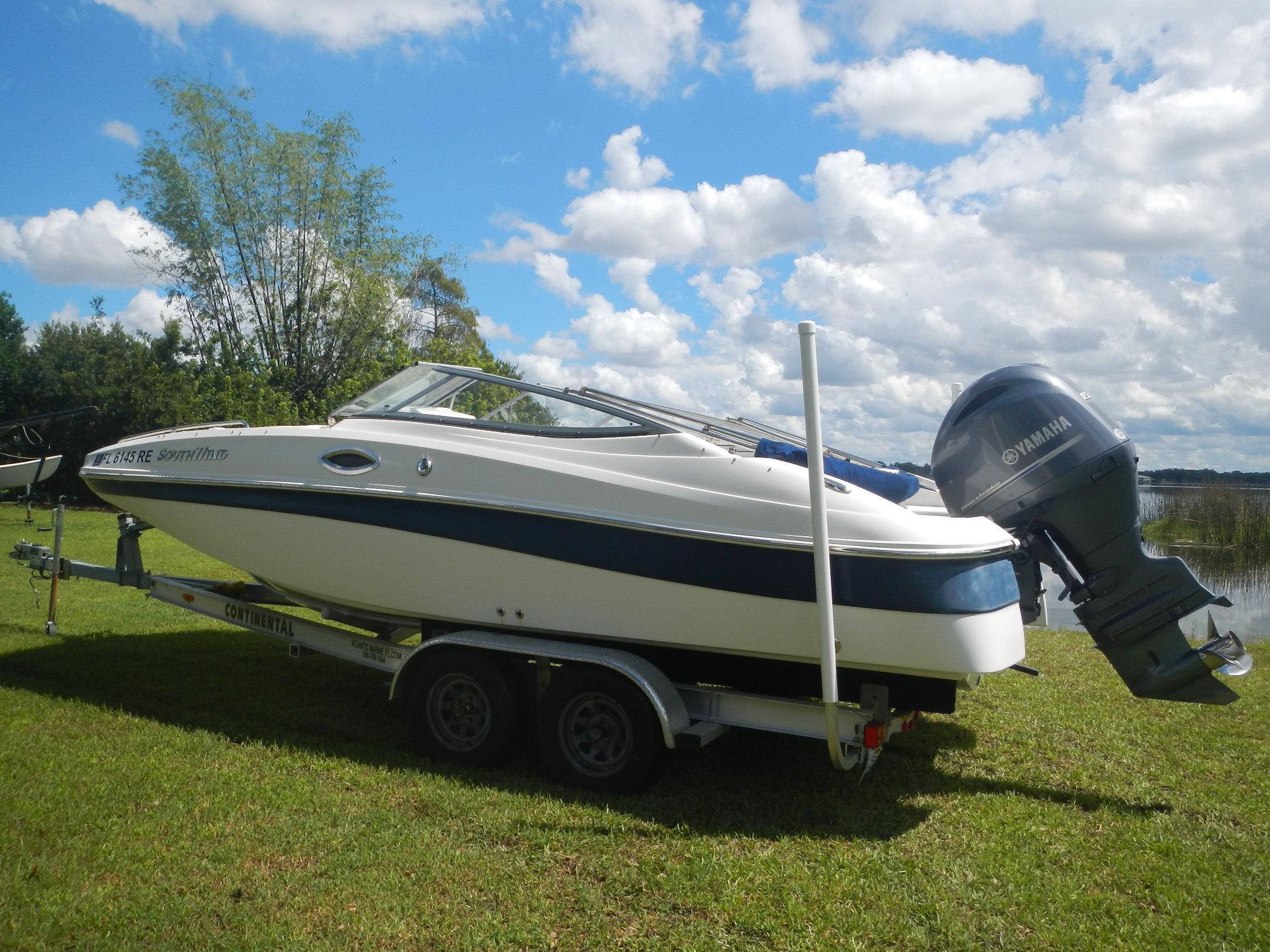 2016 SouthWind 212 SD boat on trailer with Yamaha outboard motor.
