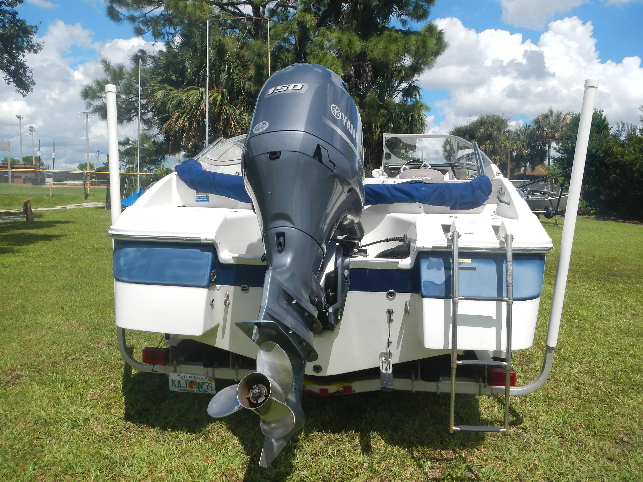 2016 SouthWind 212 SD boat with Yamaha 150 outboard motor, rear view.