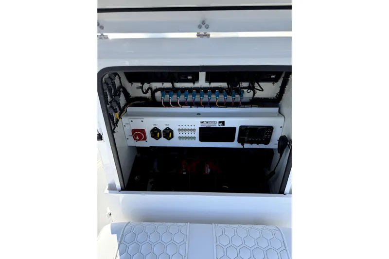  Yacht Photos Pics Electrical panel of 2024 Contender 25 Bay boat, showcasing wiring and controls.