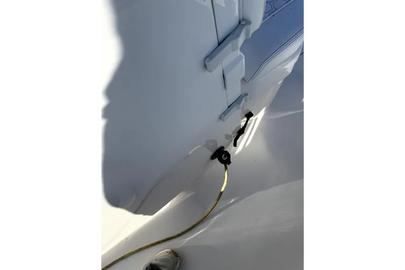  Yacht Photos Pics 2024 Contender 25 Bay boat interior with rope and latch detail.