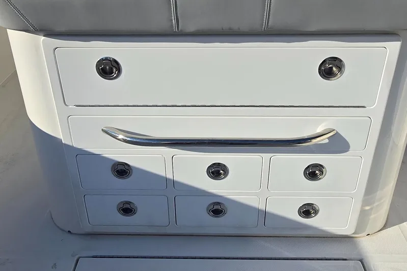 Wound Tight Yacht Photos Pics 2021 Regulator 34 Center Console storage drawers with stainless steel handles.