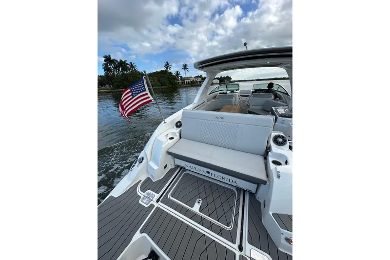 Northeast Yacht Photos Pics 2022 Sea Ray SLX 350 Outboard boat with American flag, Naples, Florida.
