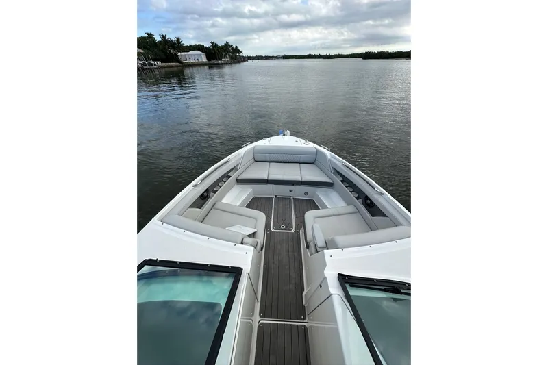 Northeast Yacht Photos Pics 2022 Sea Ray SLX 350 Outboard boat on calm water, featuring spacious seating.