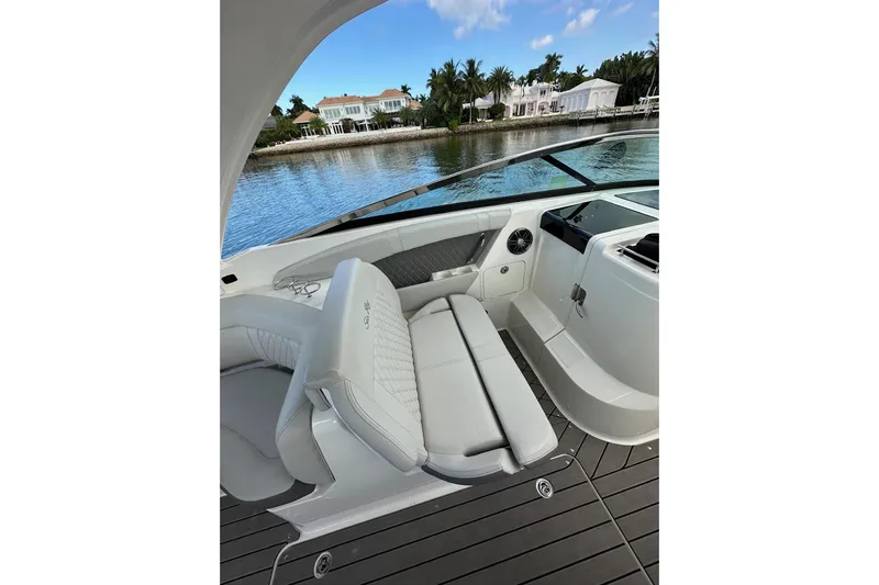 Northeast Yacht Photos Pics 2022 Sea Ray SLX 350 Outboard interior with luxurious seating and waterfront view.