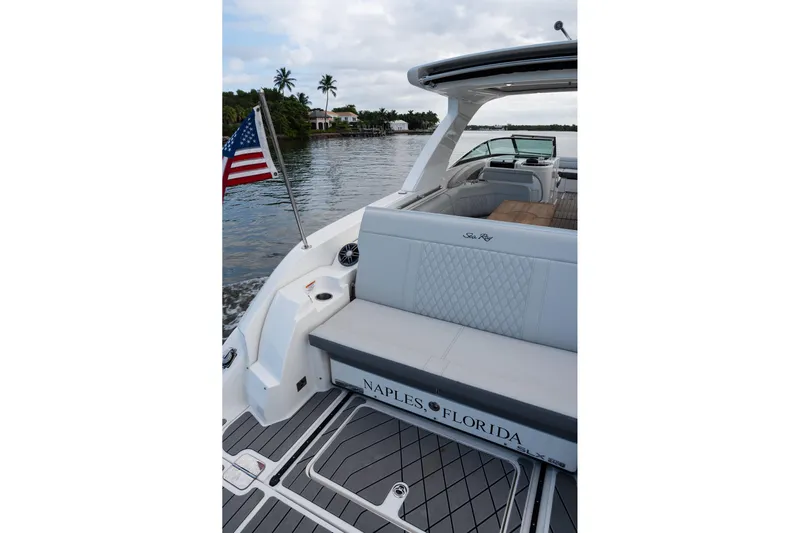 Northeast Yacht Photos Pics 2022 Sea Ray SLX 350 Outboard boat on water, Naples, Florida, with American flag.