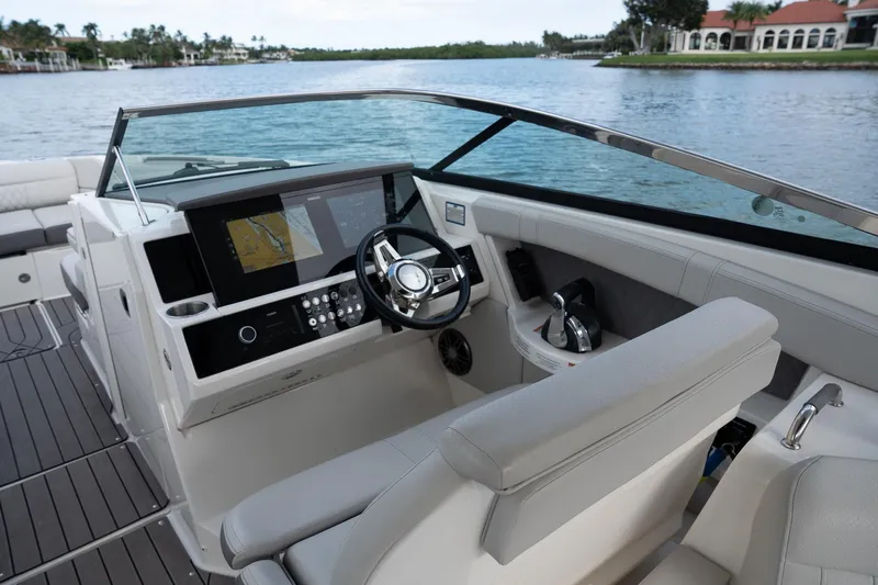Northeast Yacht Photos Pics 2022 Sea Ray SLX 350 Outboard helm with modern controls and navigation display.