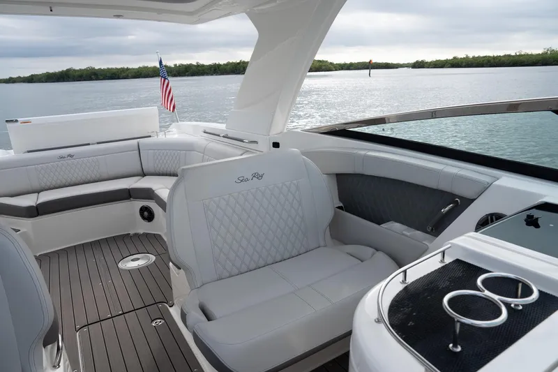Northeast Yacht Photos Pics 2022 Sea Ray SLX 350 Outboard interior with luxurious seating and scenic water view.