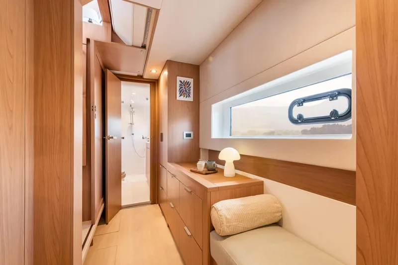  Yacht Photos Pics Luxurious interior of 2026 Bali CATSMART yacht with modern wood finishes and elegant lighting.