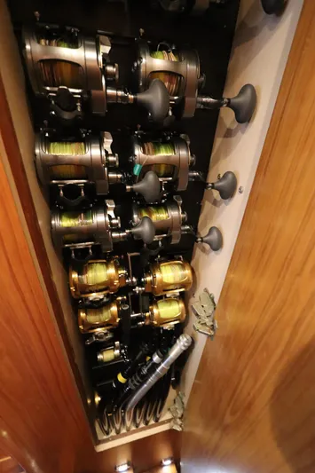 Bolita Yacht Photos Pics Fishing reels storage on a 2002 Buddy Davis 74 yacht.