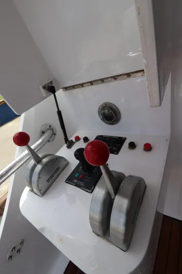 Bolita Yacht Photos Pics Control panel of a 2002 Buddy Davis 74 yacht with dual throttle levers.