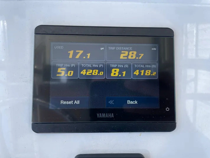 Motivated Yacht Photos Pics Yamaha display showing fuel usage and trip data on 2022 Contender 25 Tournament boat.