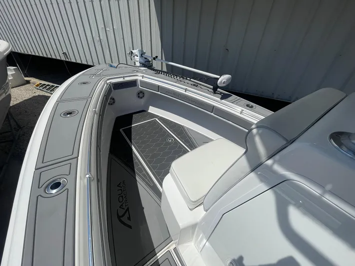 Motivated Yacht Photos Pics 2022 Contender 25 Tournament boat interior with AquaTraction flooring and seating.