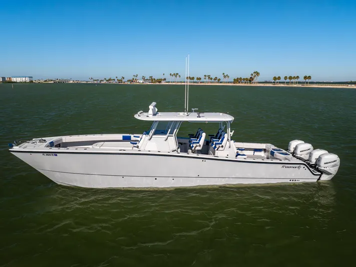  Yacht Photos Pics 2022 Freeman 42 LR boat on calm water with clear blue sky.