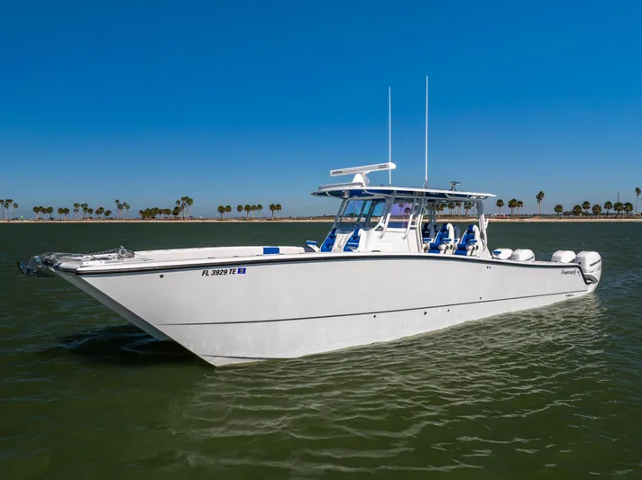  Yacht Photos Pics 2022 Freeman 42 LR boat on calm water with clear blue sky.