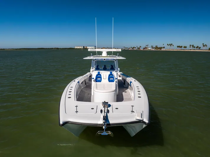  Yacht Photos Pics 2022 Freeman 42 LR boat on calm water, clear sky background.
