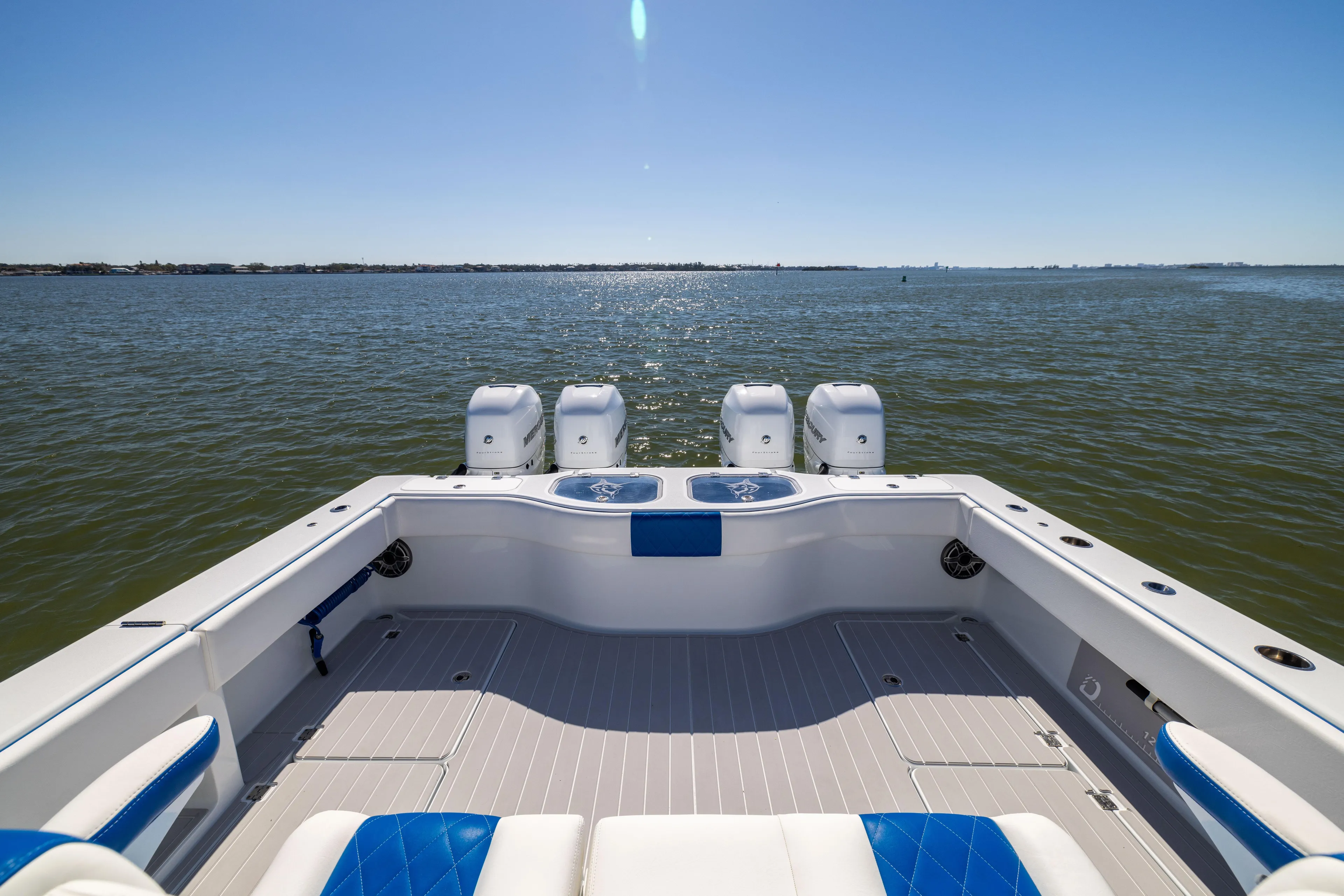  Yacht Photos Pics Freeman 42 LR 2022 boat on open water, featuring spacious deck and four engines.