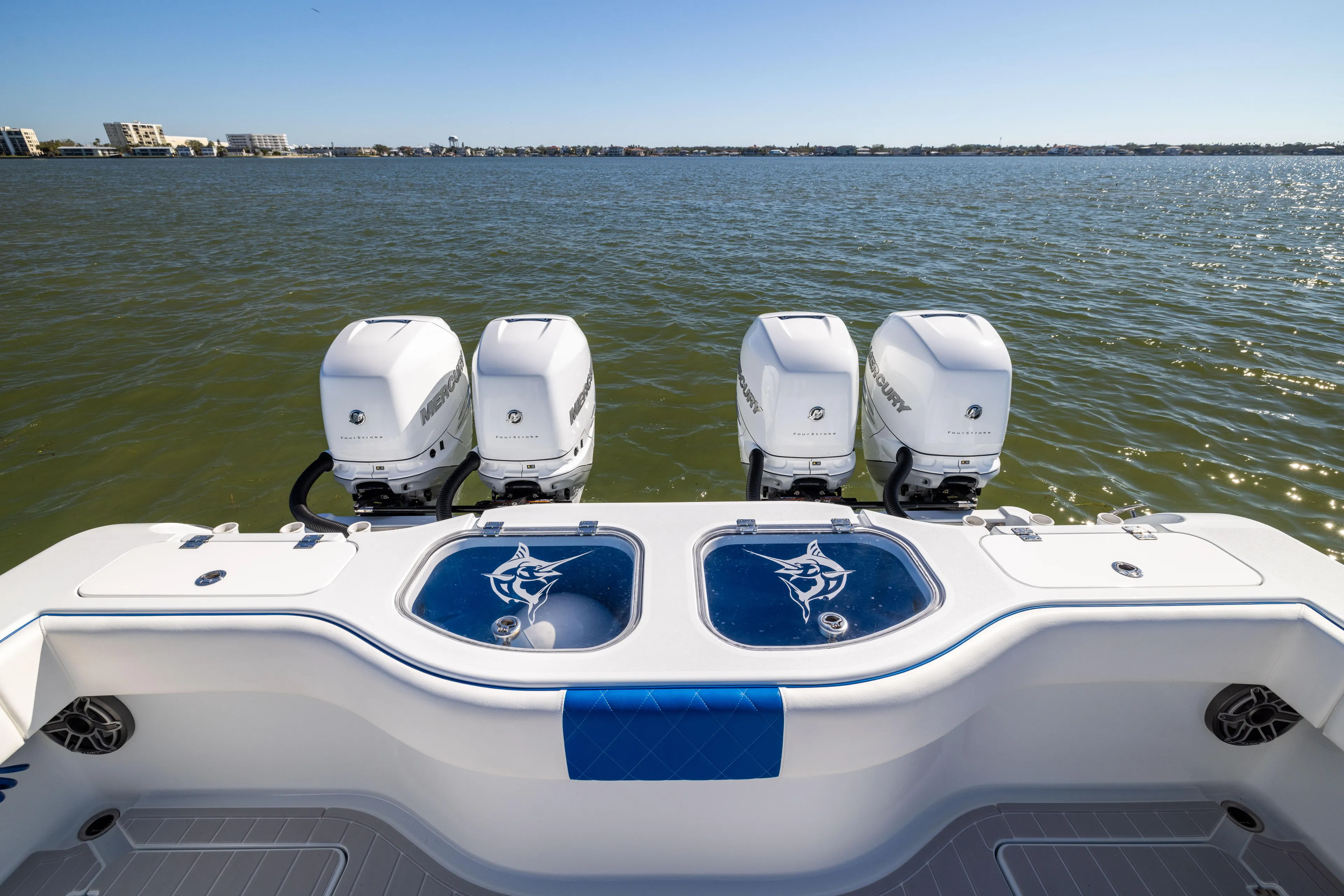  Yacht Photos Pics Freeman 42 LR 2022 boat with four outboard engines on open water.