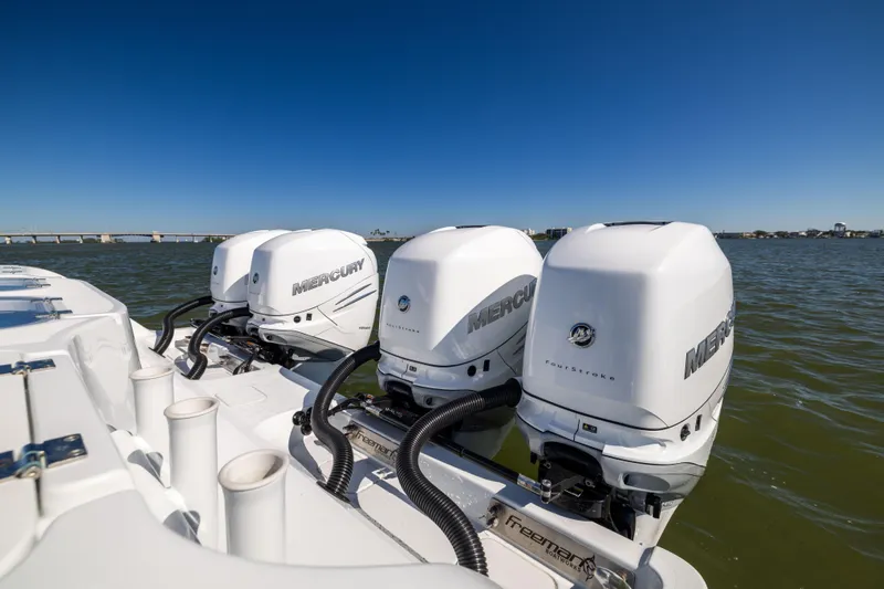  Yacht Photos Pics Freeman 42 LR 2022 boat with four Mercury outboard engines on water.